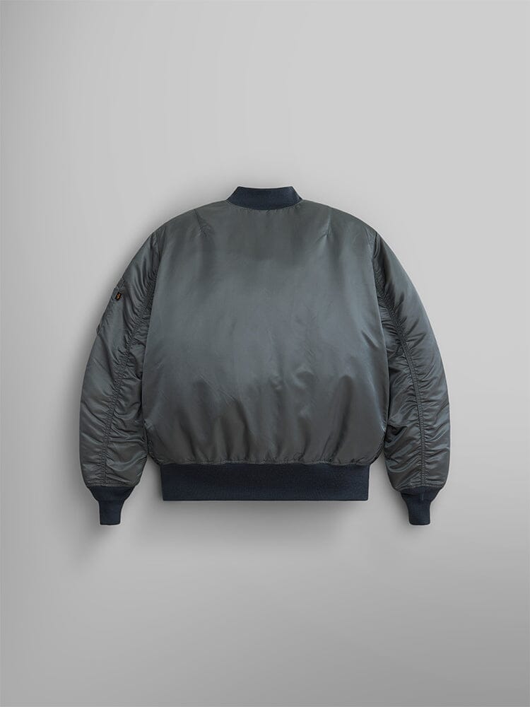 Back view of an Alpha Industries 1960s MA-1 Bomber Jacket in field gray, showcasing ribbed cuffs and waistband.