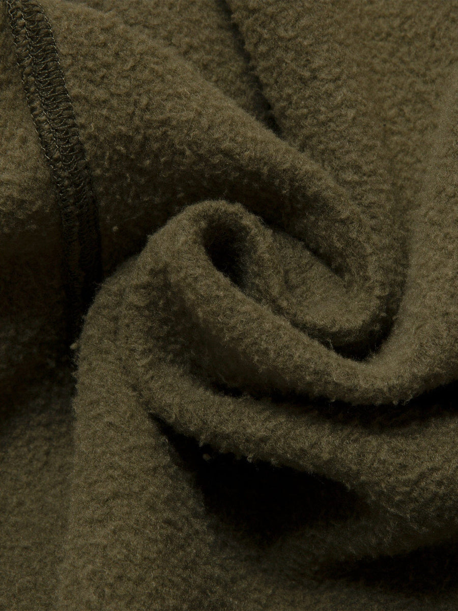 Aape X Alpha Camo Army Sweatpant by Alpha Industries in olive green fleece with visible seam and soft texture.