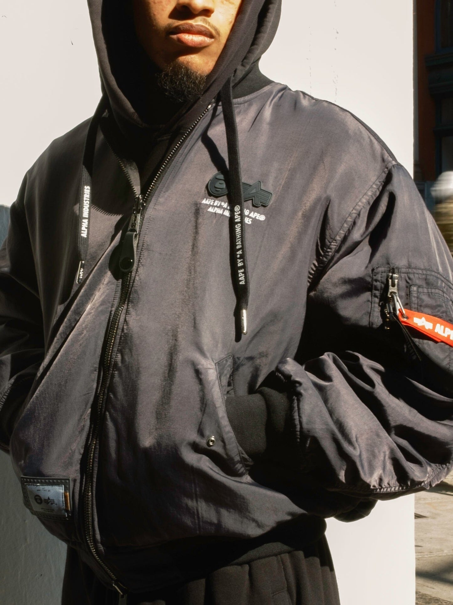 Aape X Alpha Reversible Padded MA-1 Quilted Jacket, Alpha Industries, quilted design, visible branding, reversible feature.