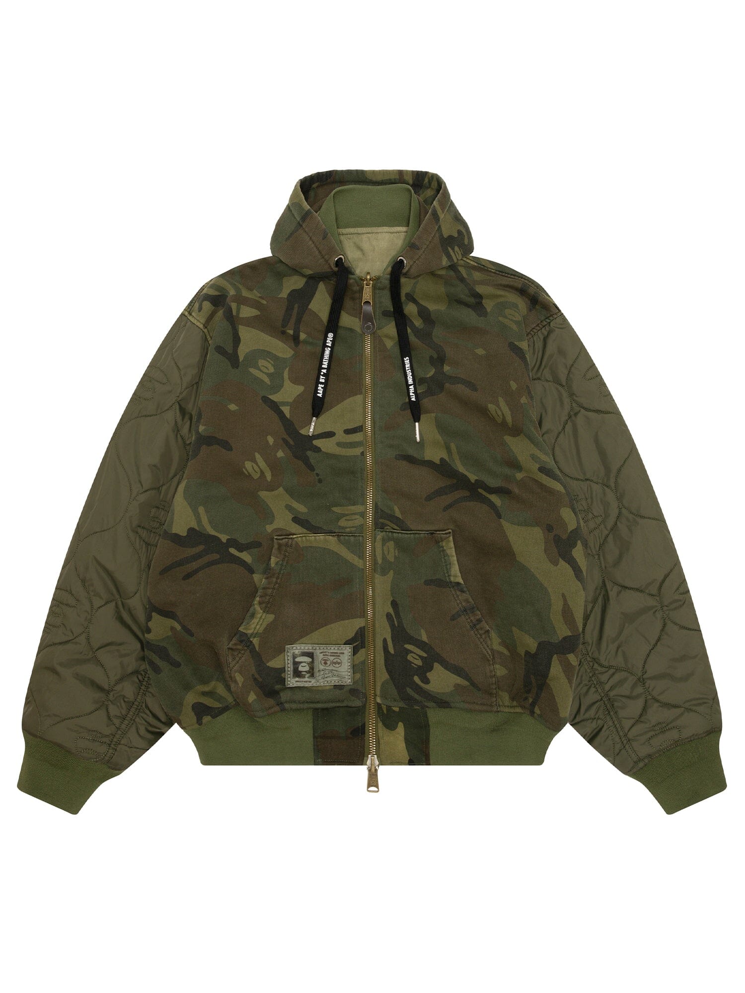 Aape X Alpha Reversible Padded MA-1 Quilted Jacket by Alpha Industries, camouflage design, front zipper, large pockets, black drawstrings, patch label.