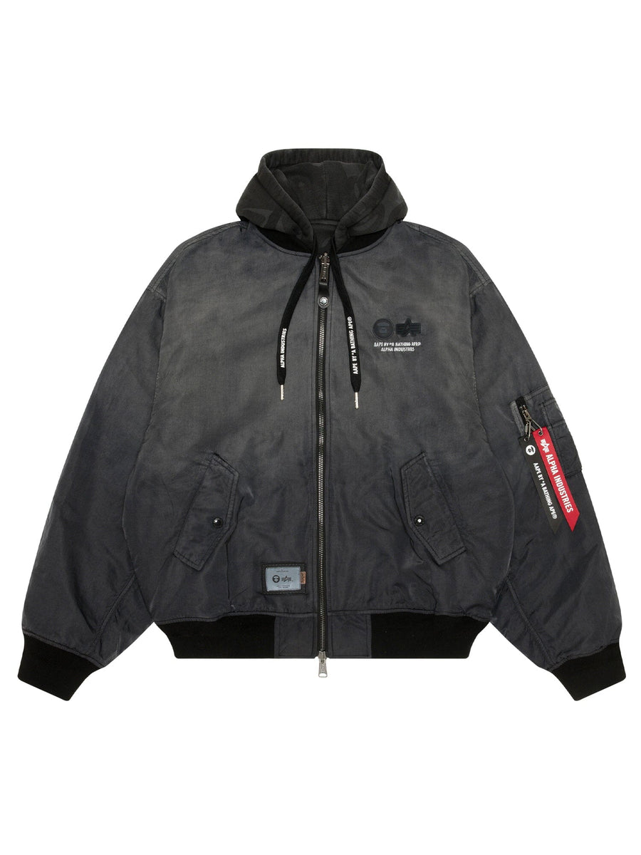 Aape X Alpha Reversible Padded MA-1 Quilted Jacket Black by Alpha Industries, hood, zip front, flap pockets, decorative sleeve tags, printed text, logo details.
