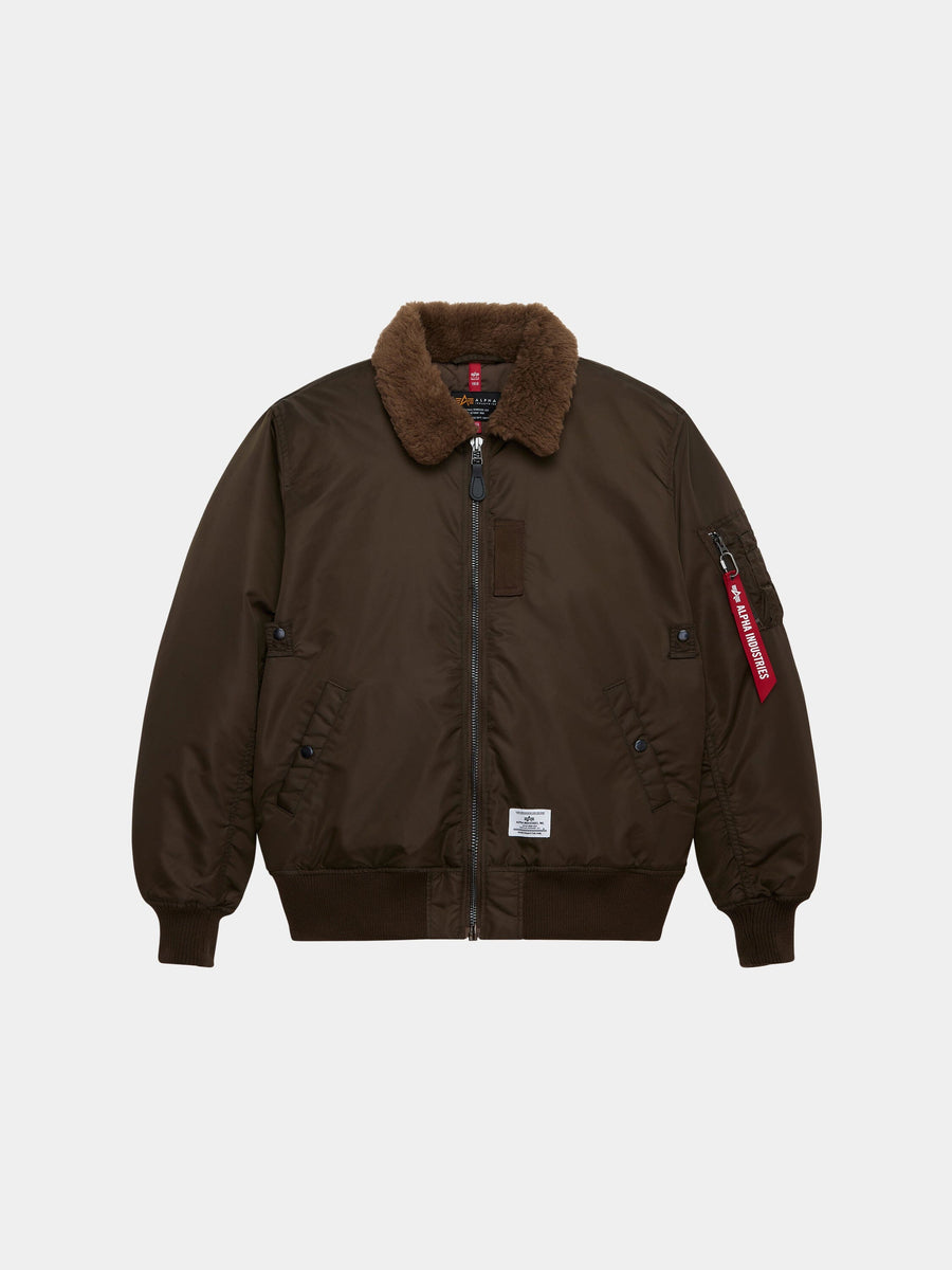 Alpha Industries B-15 Mod Bomber Jacket in espresso with faux mouton collar, front zipper, two button pockets, ribbed cuffs and hem.