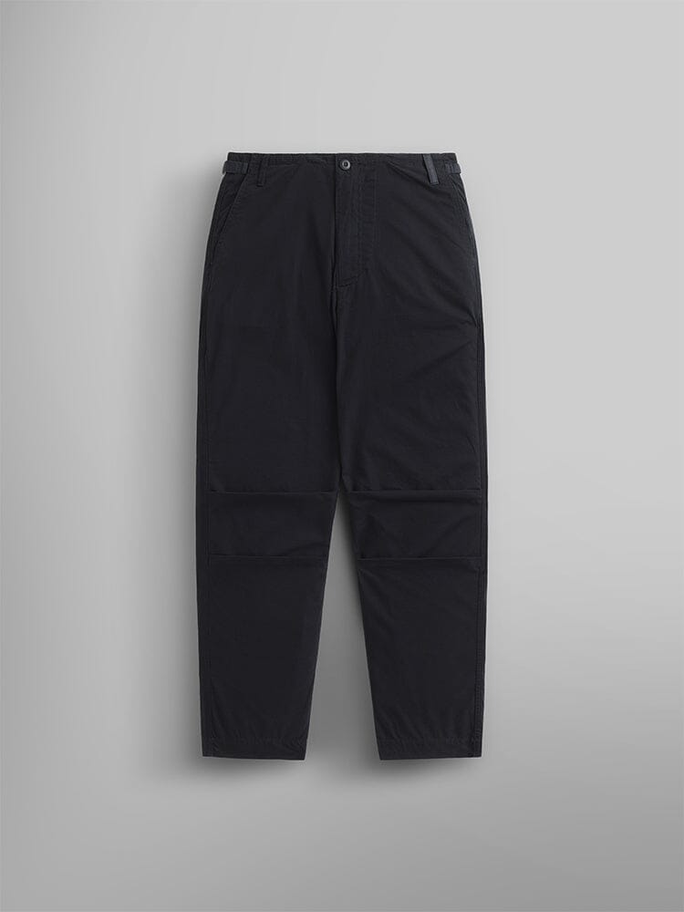 Front view of the Women's Barrel Leg Pants in Black by Alpha Industries. These high-waisted pants feature relaxed barrel legs, a button and zip closure, and convenient side pockets.