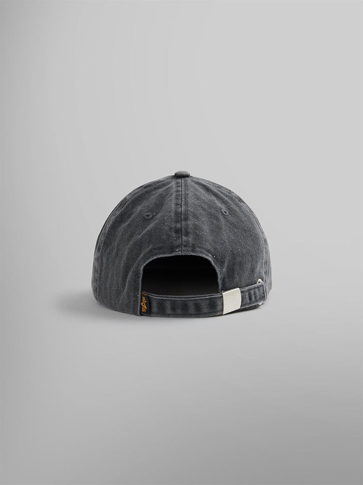 Rear view of the Battlewash Cap by Alpha Industries, featuring a vintage-inspired design in black with an adjustable strap and a small logo on the left side.