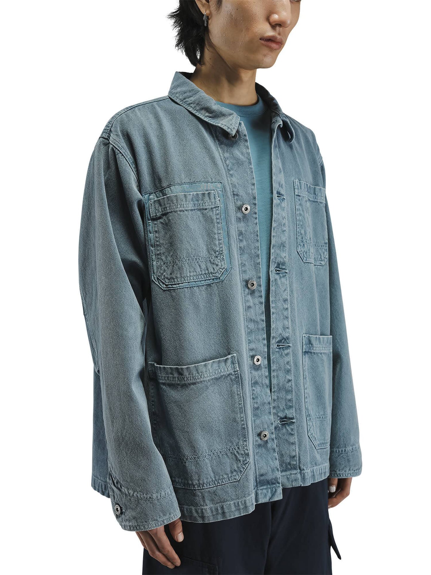 Alpha Industries Ctn Chore Coat, light blue washed cotton jacket with large front pockets and subtle nylon pocket details.