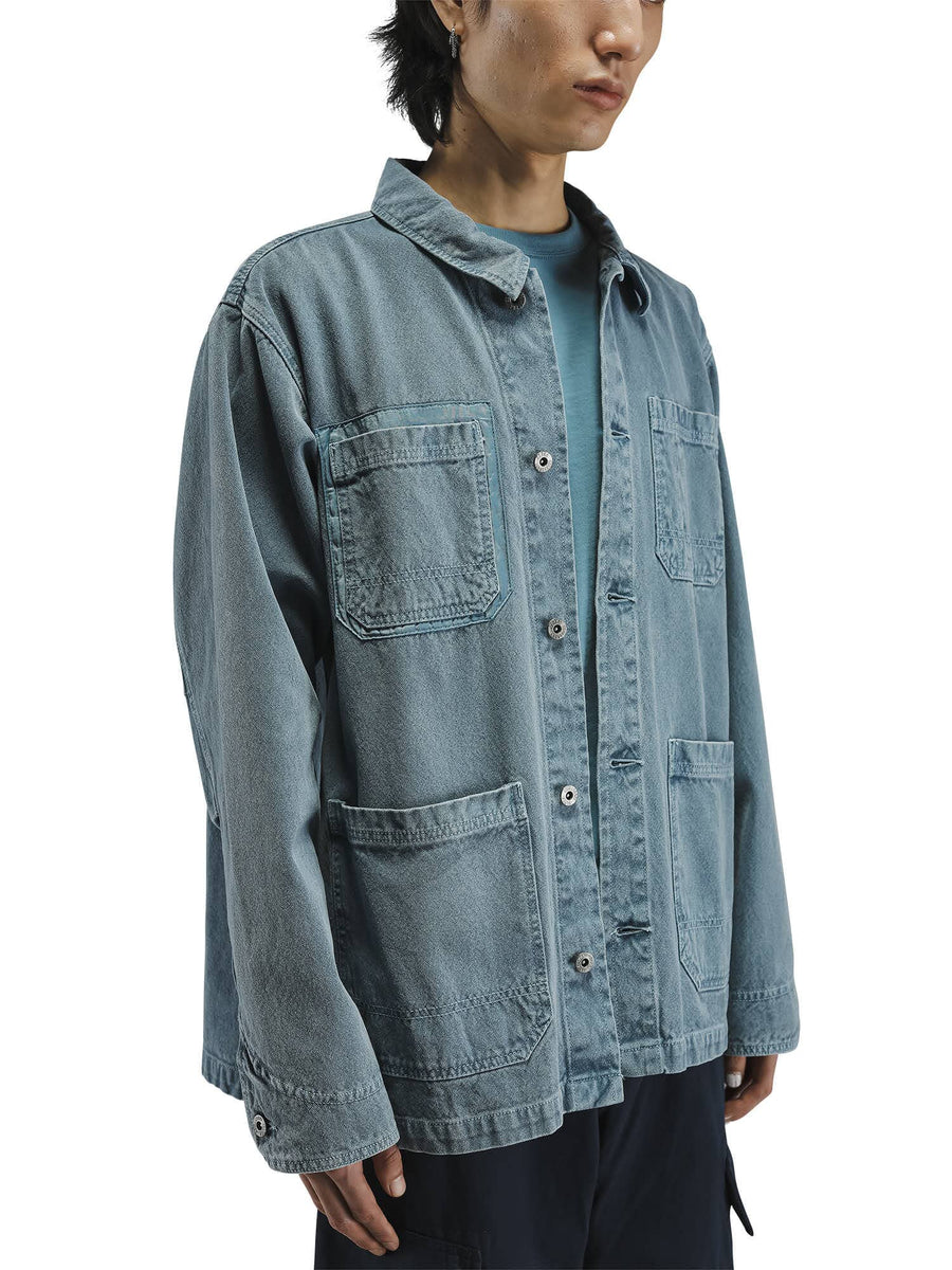 Alpha Industries Ctn Chore Coat, light blue washed cotton jacket with large front pockets and subtle nylon pocket details.