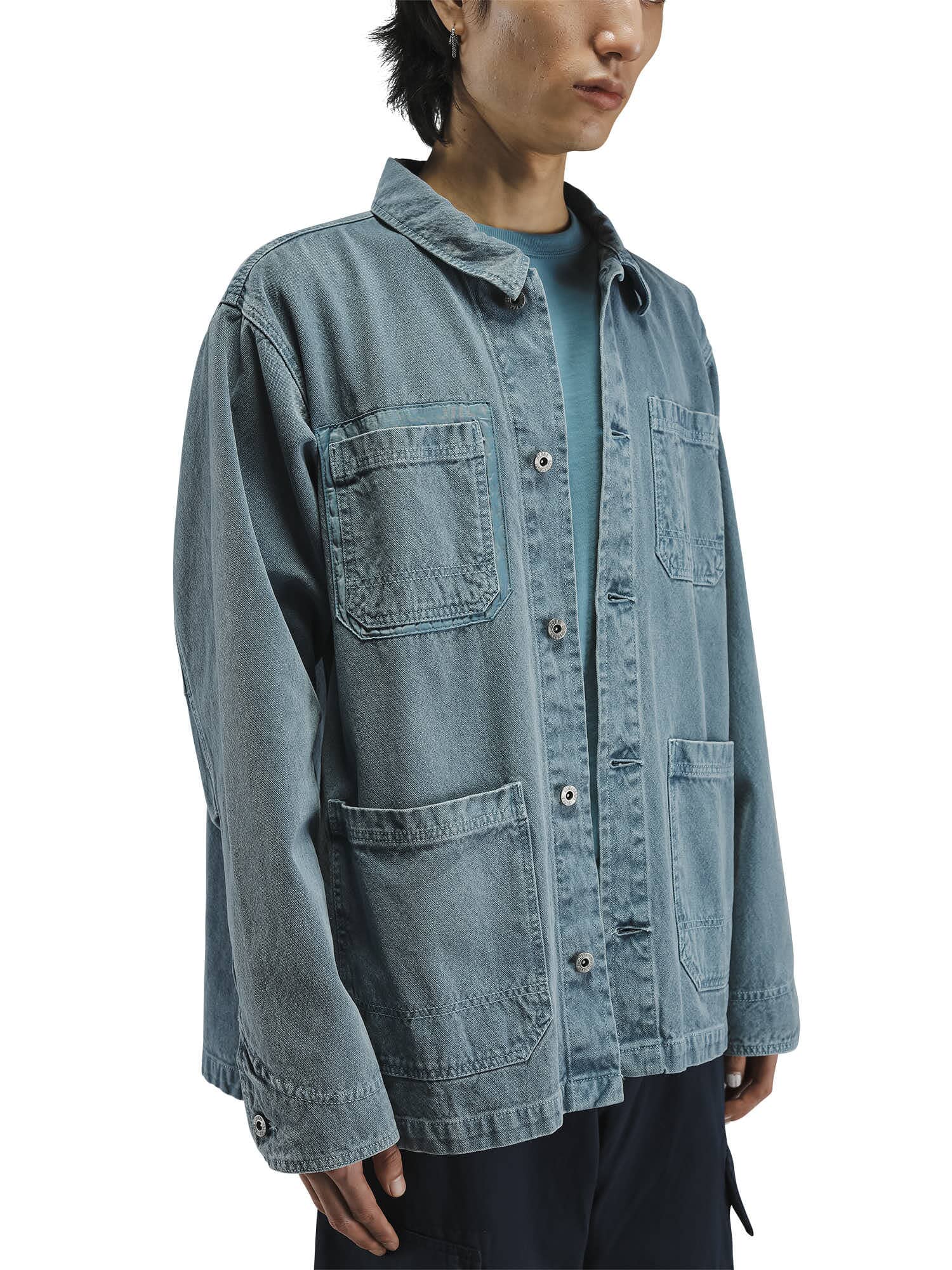 Alpha Industries Ctn Chore Coat, light blue washed cotton jacket with large front pockets and subtle nylon pocket details.