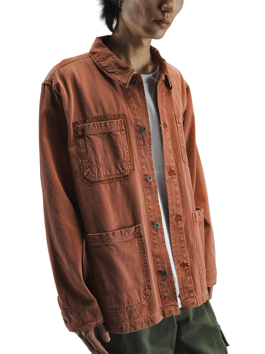 Alpha Industries Ctn Chore Coat in orange with large front pockets.