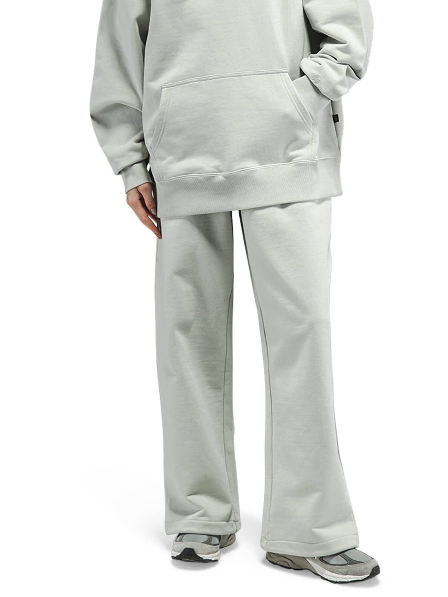 Alpha Industries Essential French Terry Sweatpant, light gray French terry sweatshirt, gray sneakers.