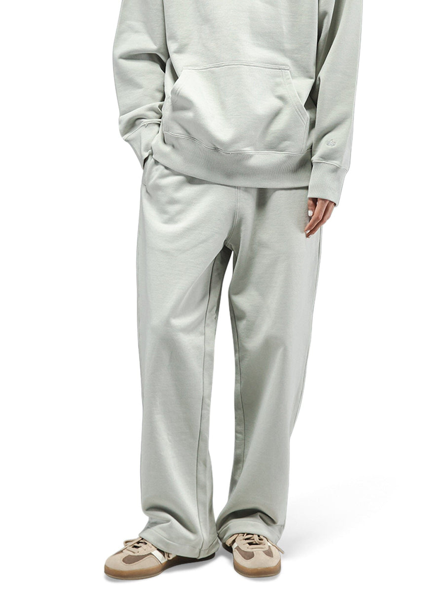 Alpha Industries Essential French Terry Sweatpant in light green with adjustable drawcord and wide-leg fit.