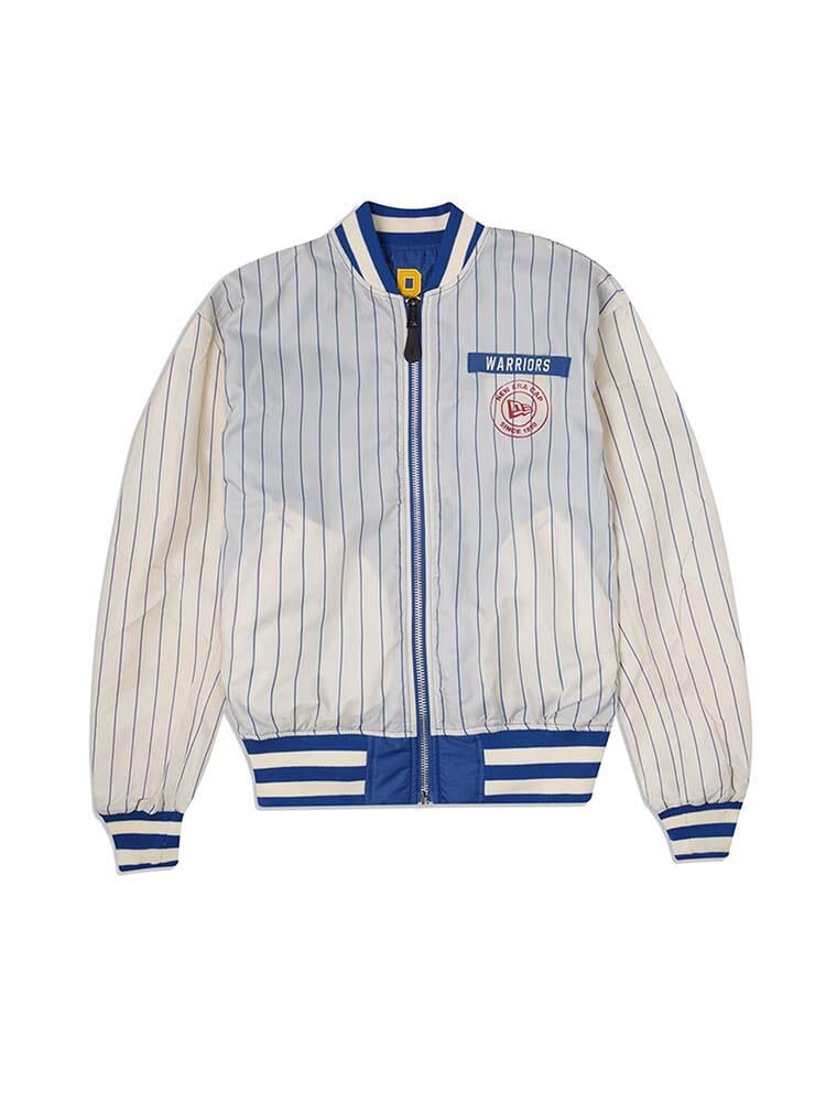 The Golden State Warriors x Alpha x New Era L-2B Bomber Jacket by Alpha Industries features a white and blue striped design with Warriors text and a red circular logo on the chest, styled as an NBA Bomber Jacket.