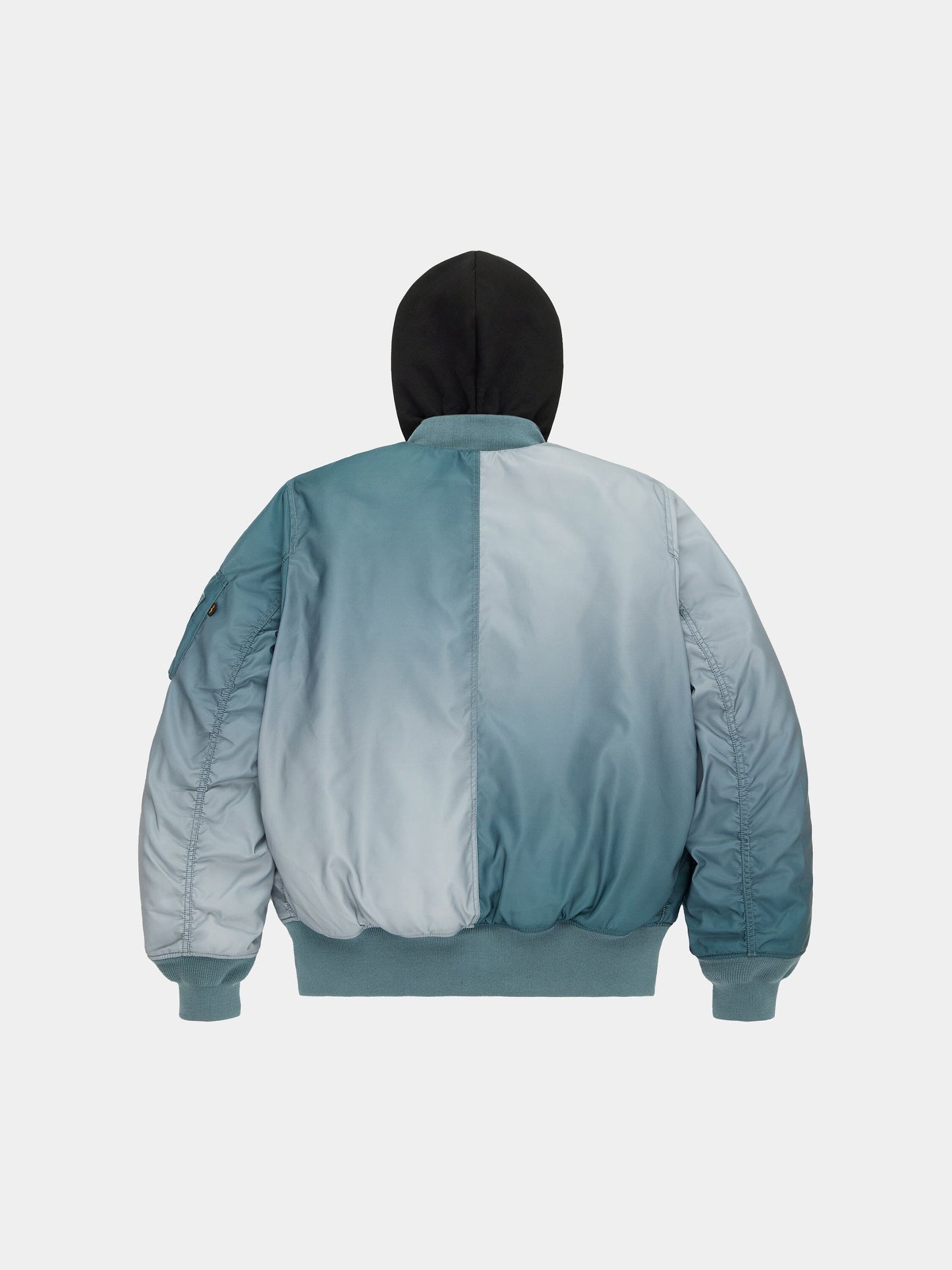 Alpha Industries Gradient Washed Flight Jacket with blue and light gray color-blocked panels, black hood, ribbed cuffs and hem.