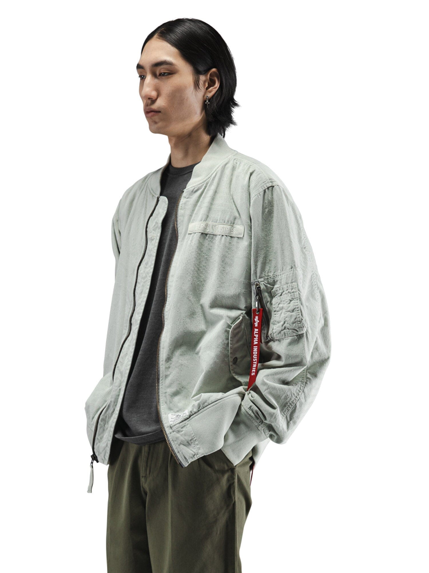 Alpha Industries L-2B Dotted Camo Flight Jacket, utility pockets, camouflage pattern, zip closure.