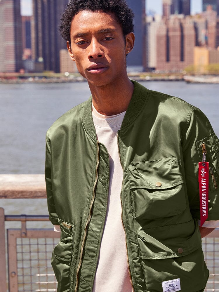 Alpha Industries L-2B Short Sleeve Bomber Jacket, green, water-resistant nylon, utility pocket, signature tag.
