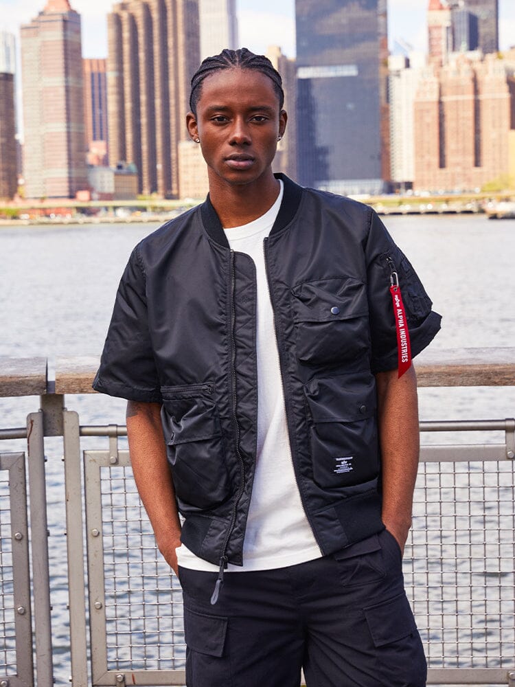 Alpha Industries L-2B Short Sleeve Bomber Jacket, white, lightweight material, front zipper closure.