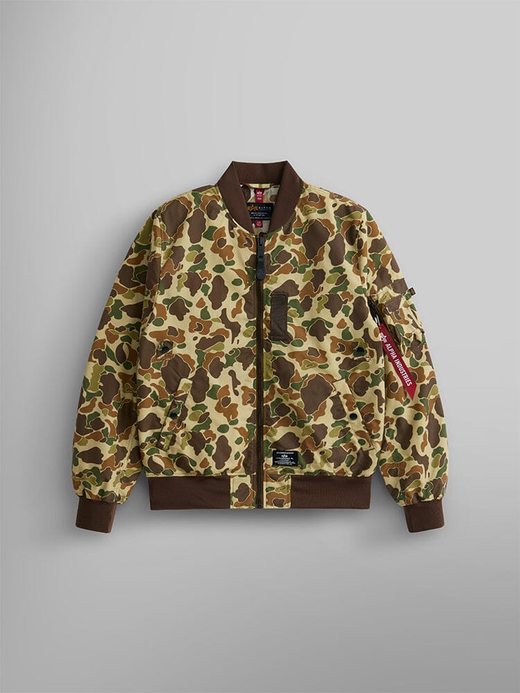 Alpha Industries L-2B Skymaster Gen II Bomber Jacket, camouflage pattern, brown collar, cuffs and hem, black zipper, red Remove Before Flight tag on left sleeve, oxygen tab details.