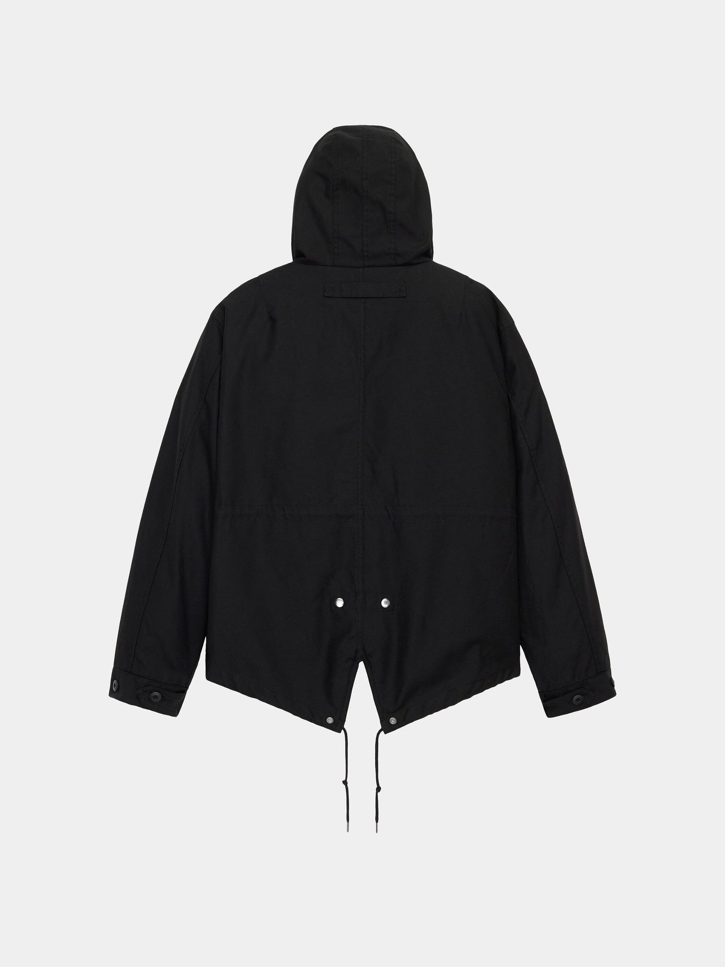 Alpha Industries M-65 Mod Fishtail Field Coat in black with long sleeves, adjustable cuffs, and drawstring hem.