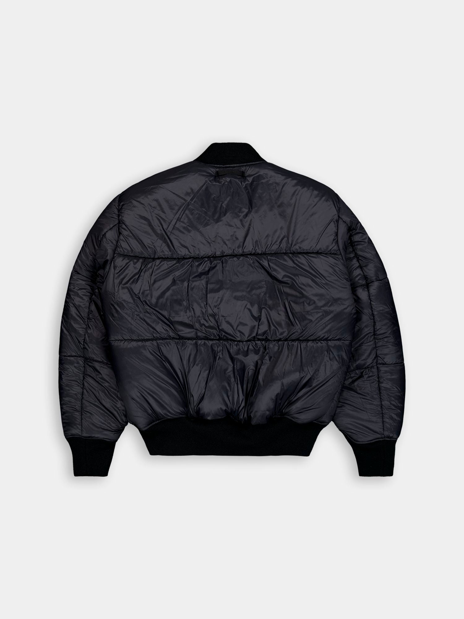 Alpha Industries MA-1 jacket with ribbed collar, cuffs, and hem; back view shown.