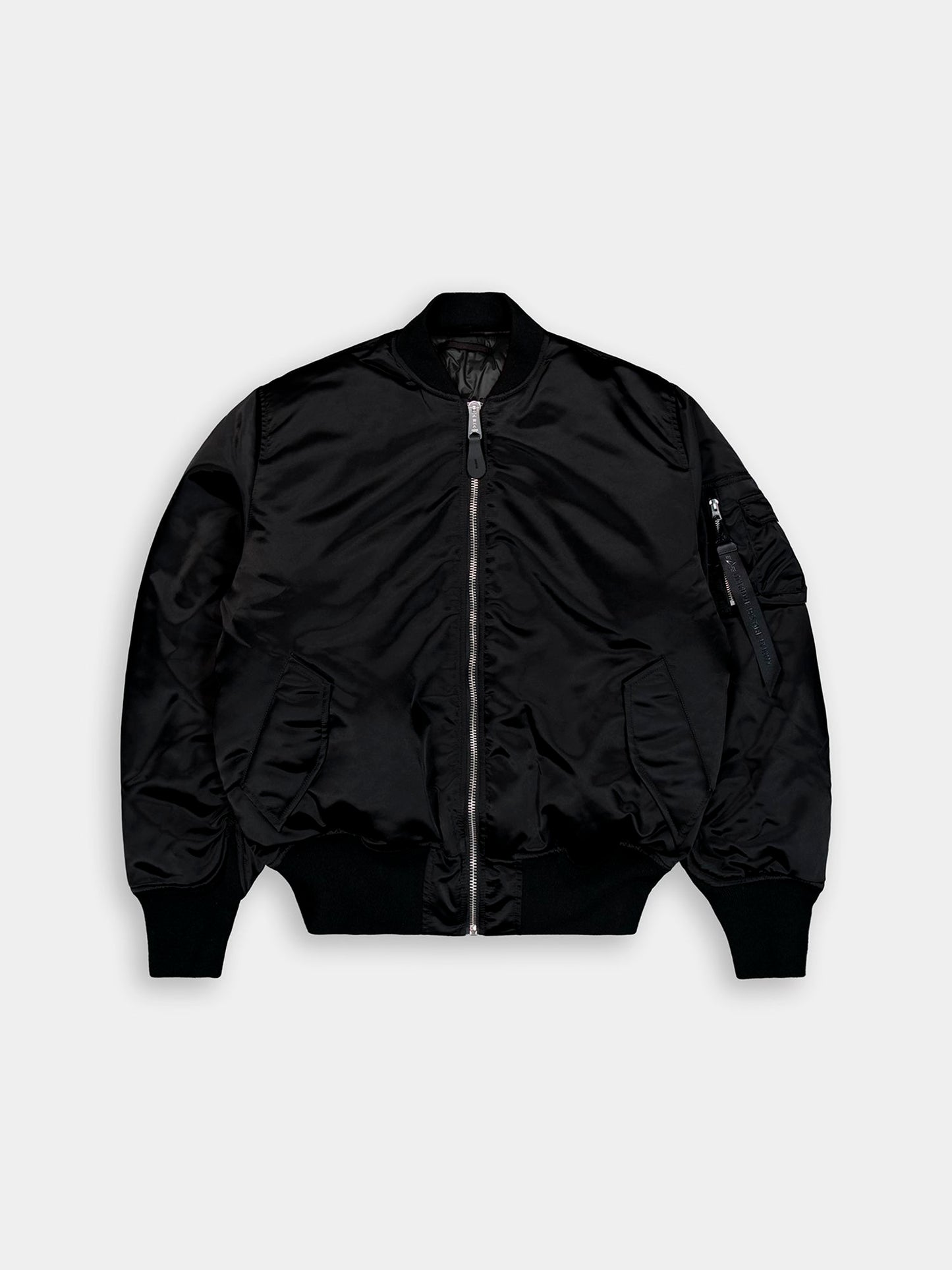 Alpha Industries MA-1 3M Base Flight Jacket in black with front zipper, ribbed cuffs and hem, two front pockets, zippered sleeve pocket.