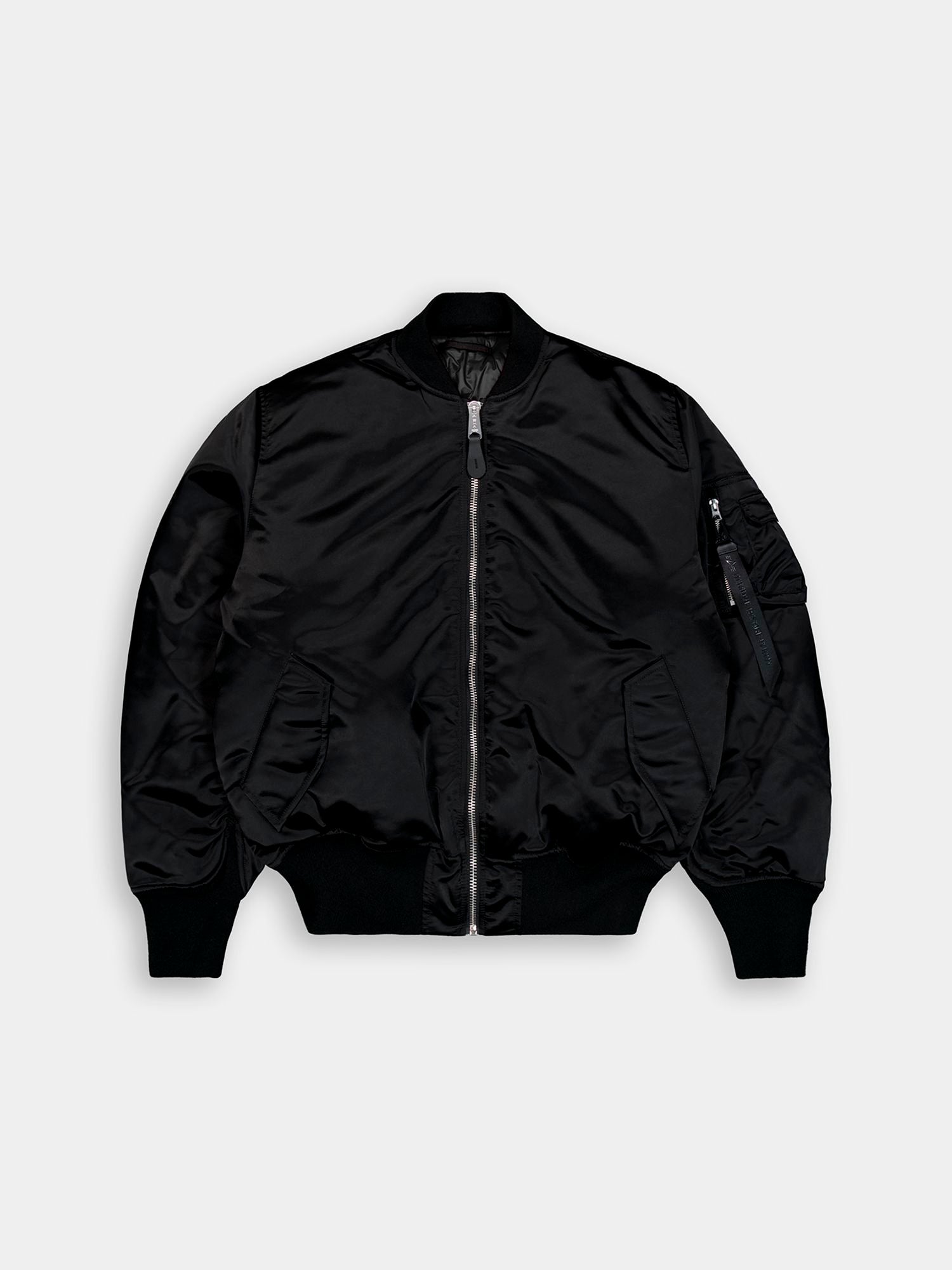 Alpha Industries MA-1 3M Base Flight Jacket in black with front zipper, ribbed cuffs and hem, two front pockets, zippered sleeve pocket.