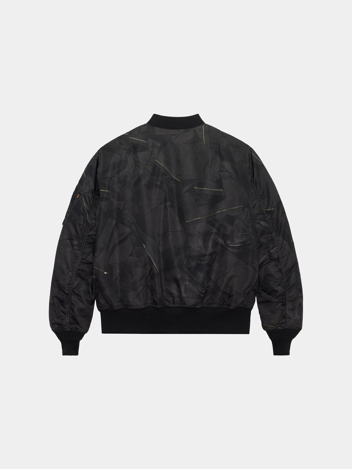 Alpha Industries MA-1 Zippered Print Flight Jacket with abstract patterns, ribbed cuffs and hem.