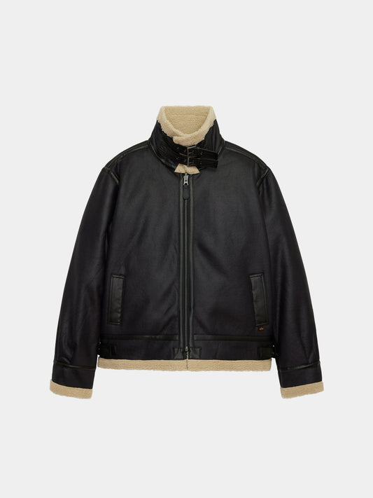 Mouton B-3 by Alpha Industries, black faux leather aviator jacket with shearling lining, front zipper, buckle collar, beige trim.