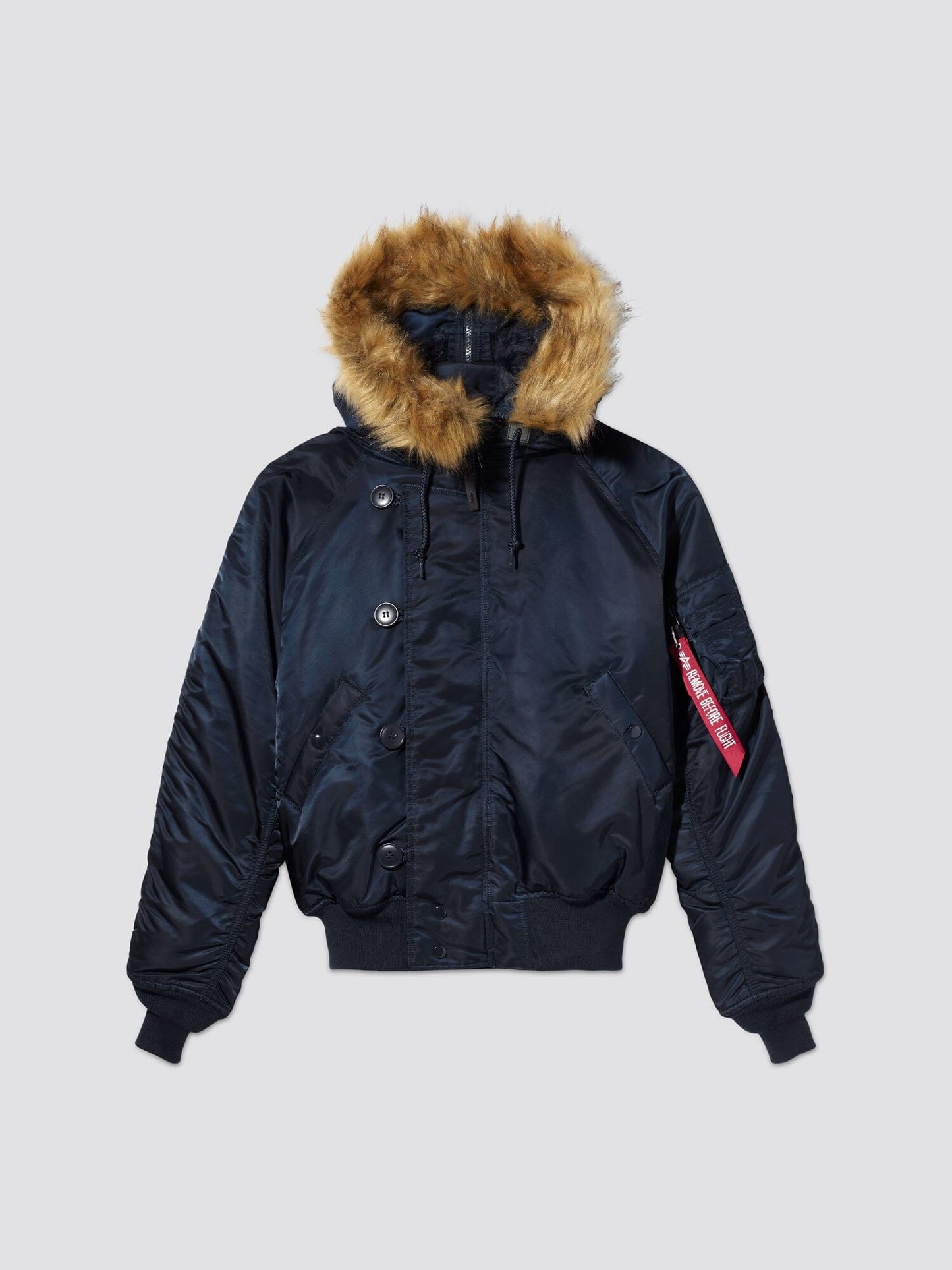 Alpha Industries N-2B Short Waist Parka in Replica Blue with water-repellent finish, faux mouton fur-lined hood, button and zipper closure, ribbed cuffs and hem, red sleeve tag.