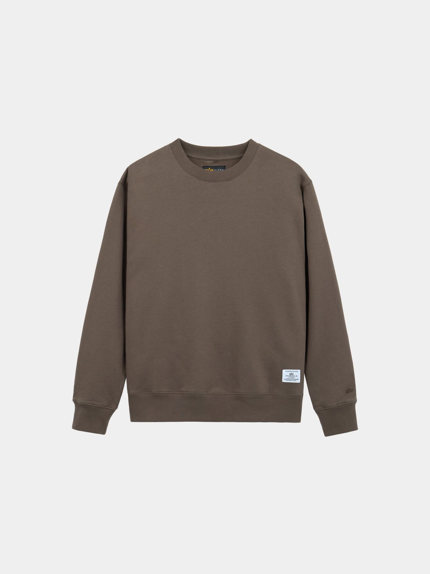 Patched Crewneck by Alpha Industries, brown sweatshirt with crewneck, long sleeves, ribbed cuffs and hem, cotton-poly blend, small white label near hem.