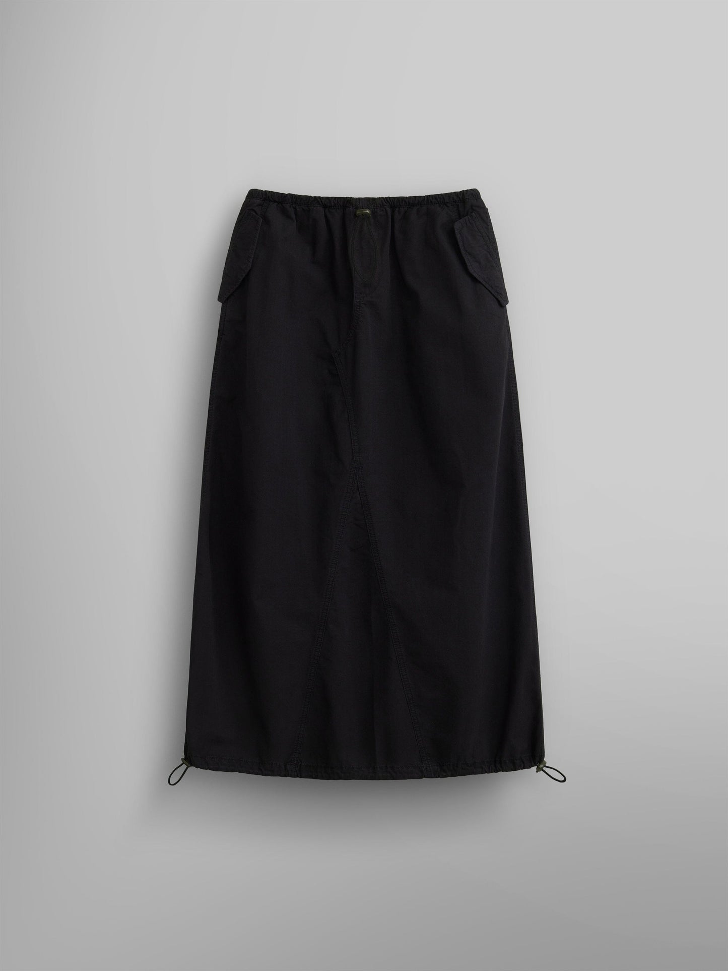 The Women's Drawcord Skirt by Alpha Industries features a black mid-length design with a drawstring hem and bungee waistband.