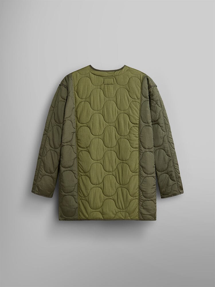Back view of the Women's Mixed Media Quilted Long Liner in OG-107 Green by Alpha Industries features stylish onion quilting with large circles on the back and vertical side stitching.