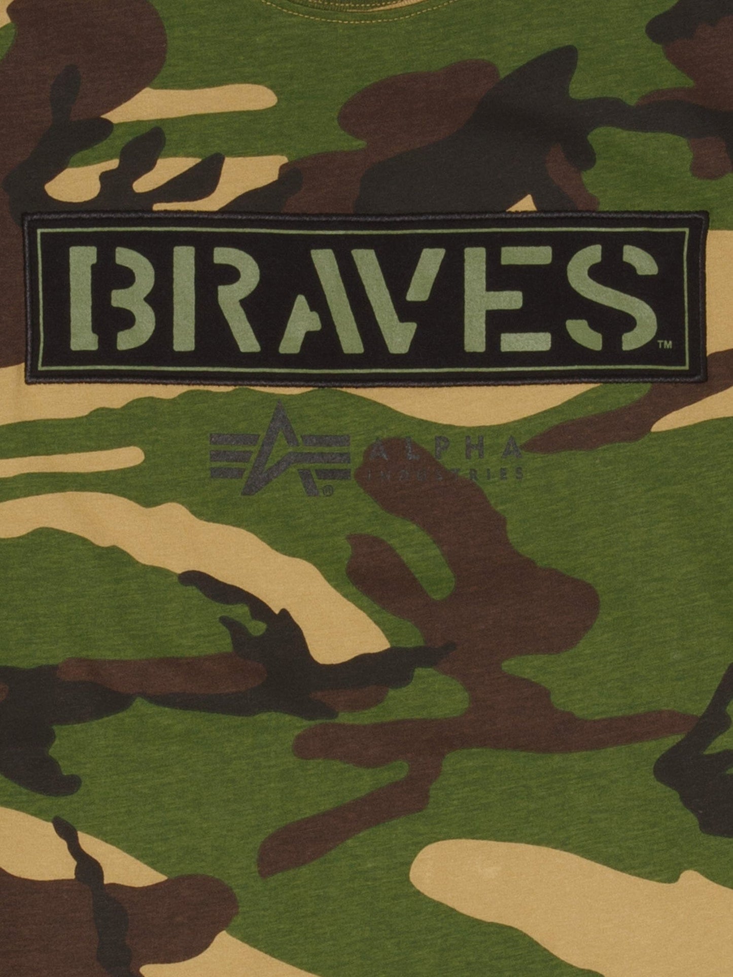 Atlanta Braves X Alpha Industries Camo T-Shirt, green, brown, and tan camo pattern with black patch displaying Braves in white stencil-style letters and team logo below.