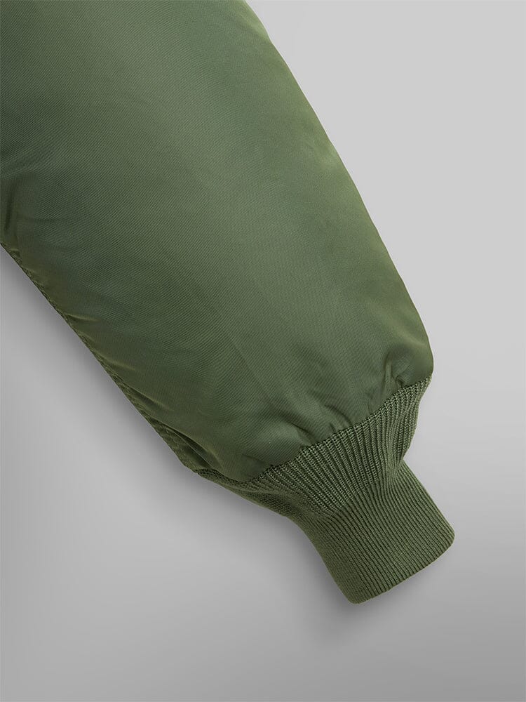 B-15 Bomber Jacket by Alpha Industries, green sleeve with ribbed cuff, water-resistant material.