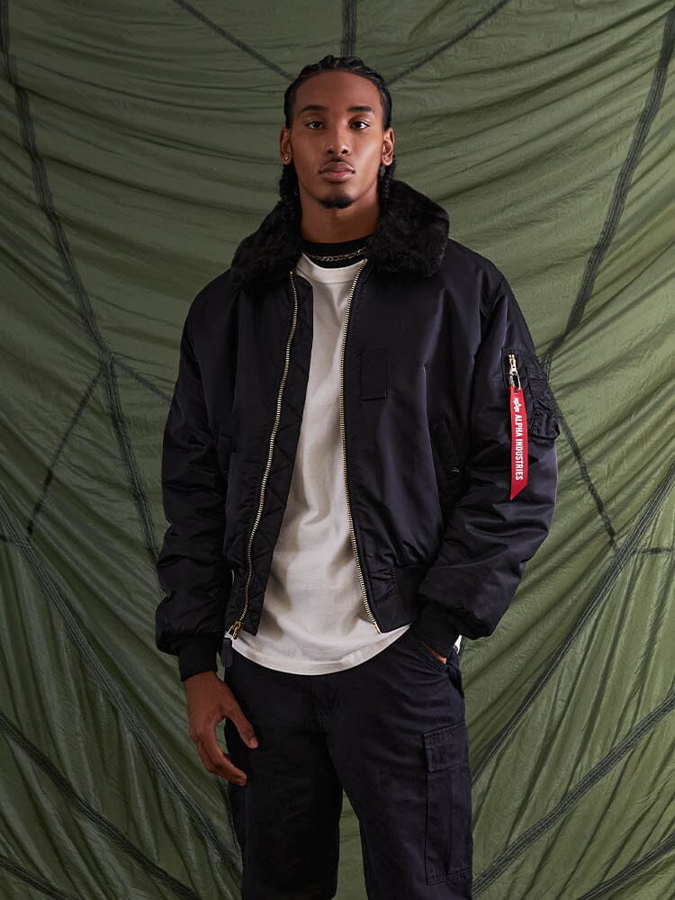 Alpha Industries B-15 Bomber Jacket, black, water-resistant, removable faux-mouton collar.
