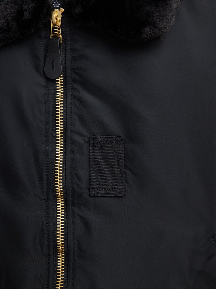 Alpha Industries B-15 Bomber Jacket, water-resistant finish, gold zipper, black fabric patch, removable faux-mouton collar with black trim.