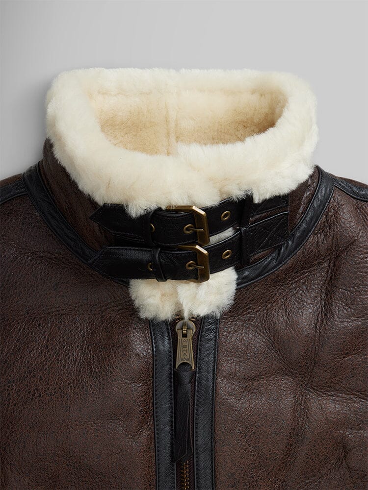 Alpha Industries B-3 Sherpa Leather Bomber Jacket, genuine leather, white sheepskin lining, two buckle straps, central zipper.