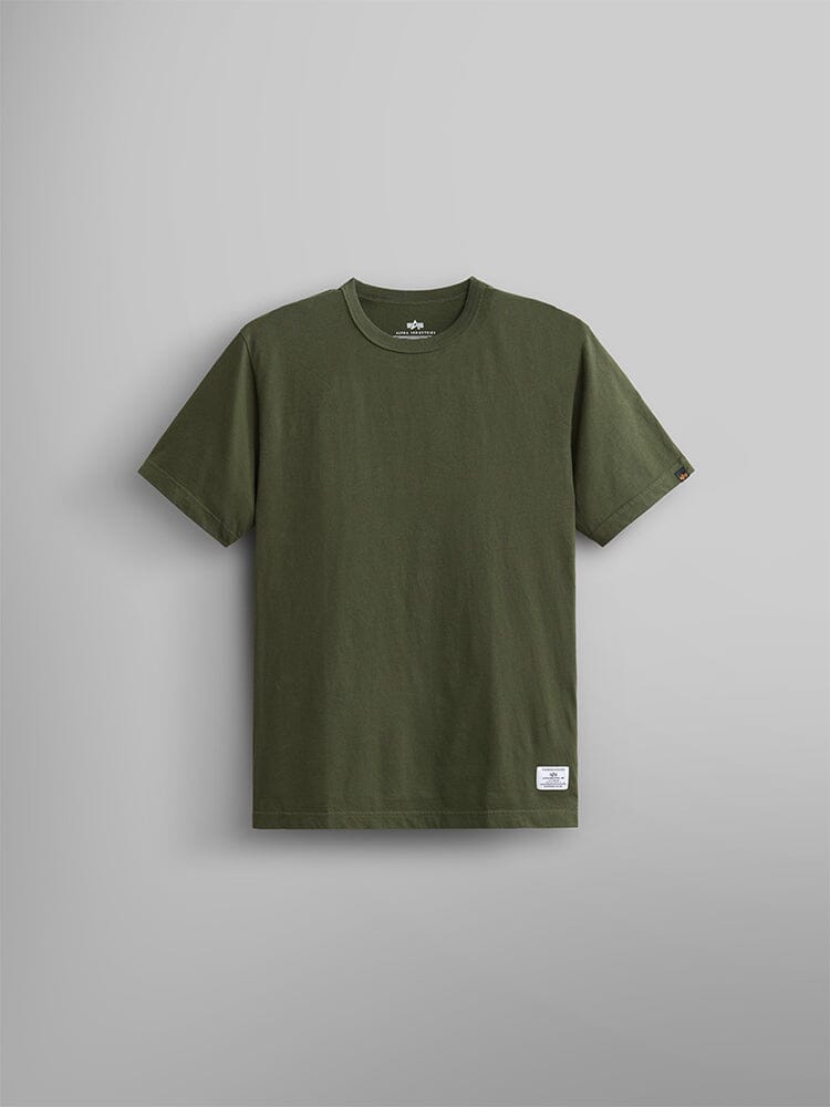 Alpha Industries Essential Tee: olive green cotton t-shirt with short sleeves and a small white label near the bottom hem.