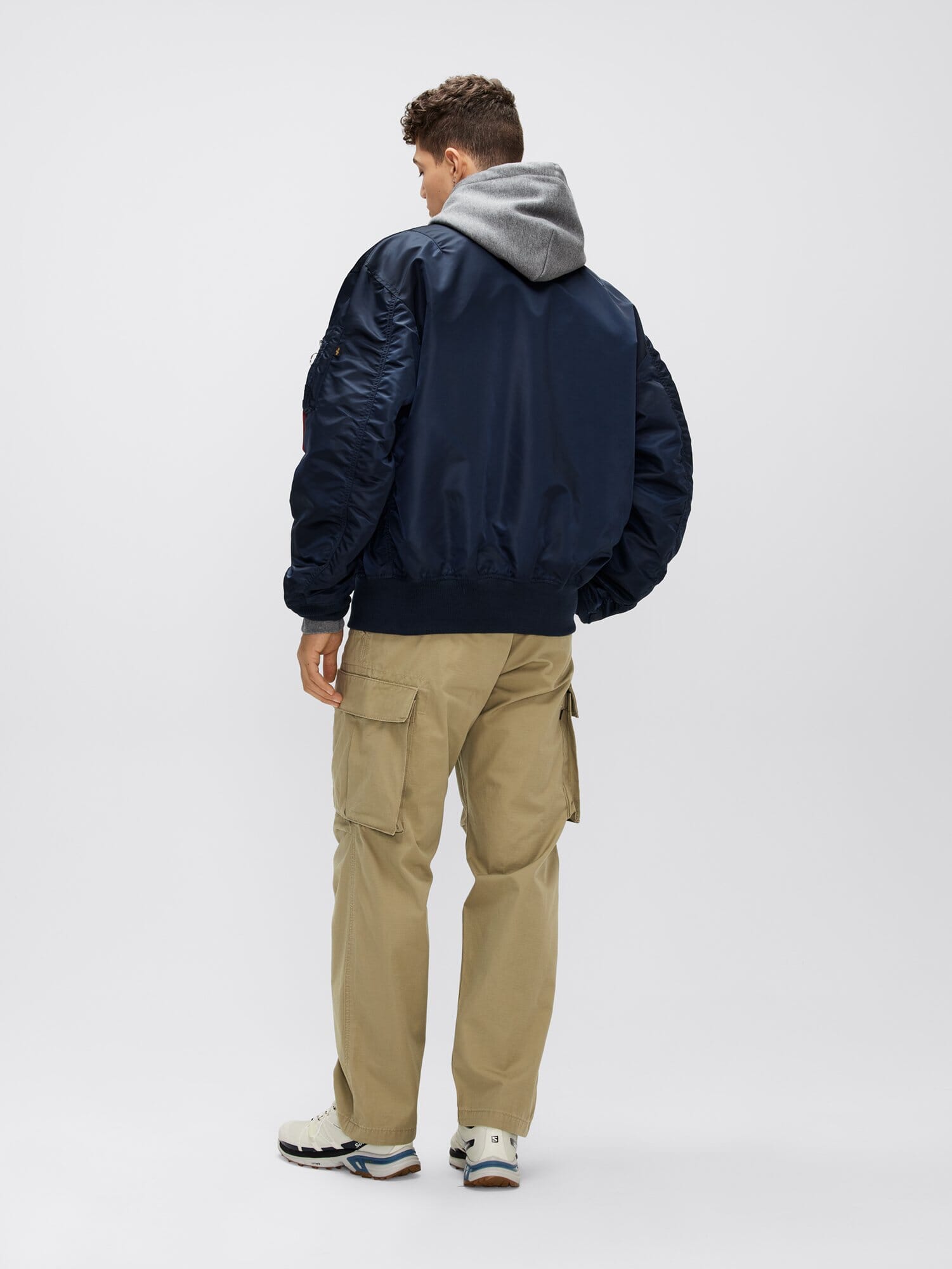 Alpha Industries L-2B Loose Bomber Jacket, navy, nylon material, front zipper closure.