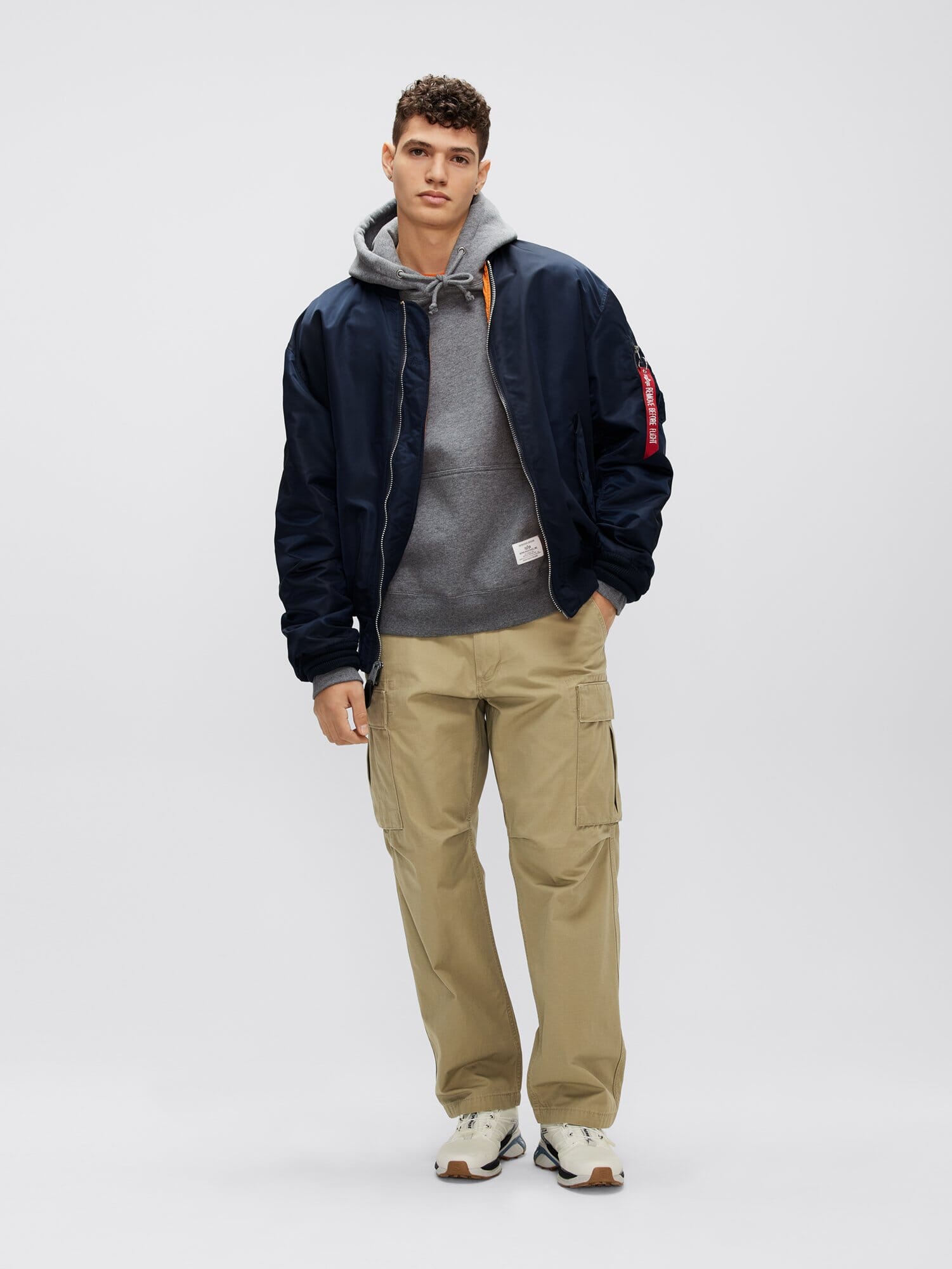 Alpha Industries L-2B Loose Bomber Jacket, navy, zip closure.