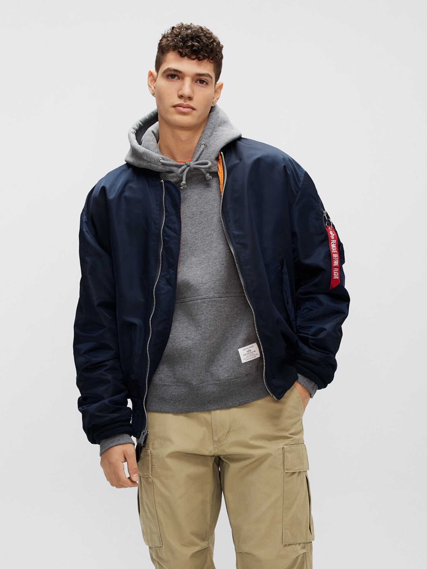 Alpha Industries L-2B Loose Bomber Jacket in Replica Blue, lightweight material, front zipper closure, ribbed cuffs and hem.