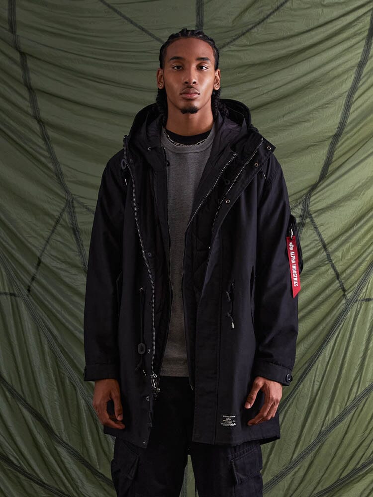 Alpha Industries M-59 Fishtail Mod Parka with Quilted Fishtail Liner, Green, Button and Zip Closure.