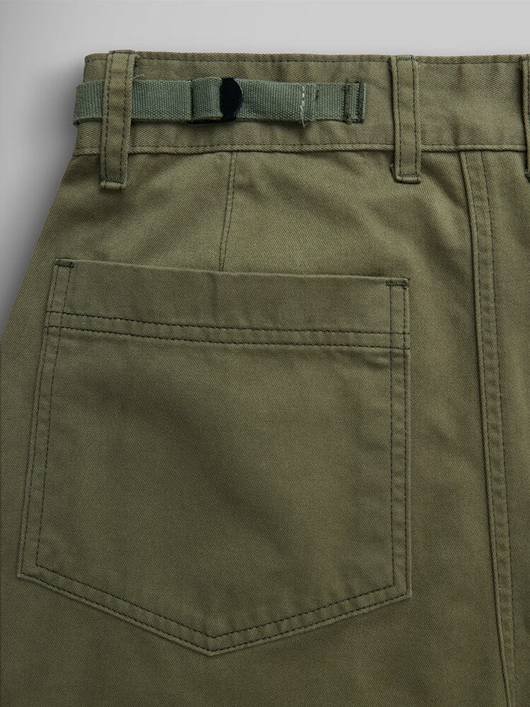 Alpha Industries M-65 Cargo Pant Womens in olive green with back pocket, belt loop, and adjustable strap at waistband.