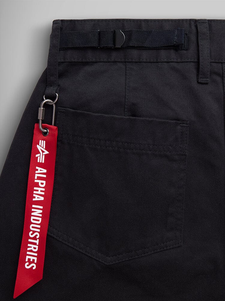 Alpha Industries M-65 Cargo Pant Womens in black with back pocket, red tag on metal clip at belt loop.
