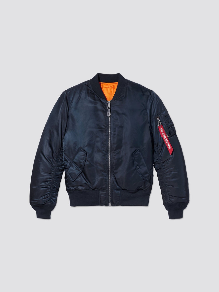 Front flat-lay view of replica blue Alpha Industries MA-1 Bomber Jacket Slim Fit showing orange lining and sleeve pocket with red tag.