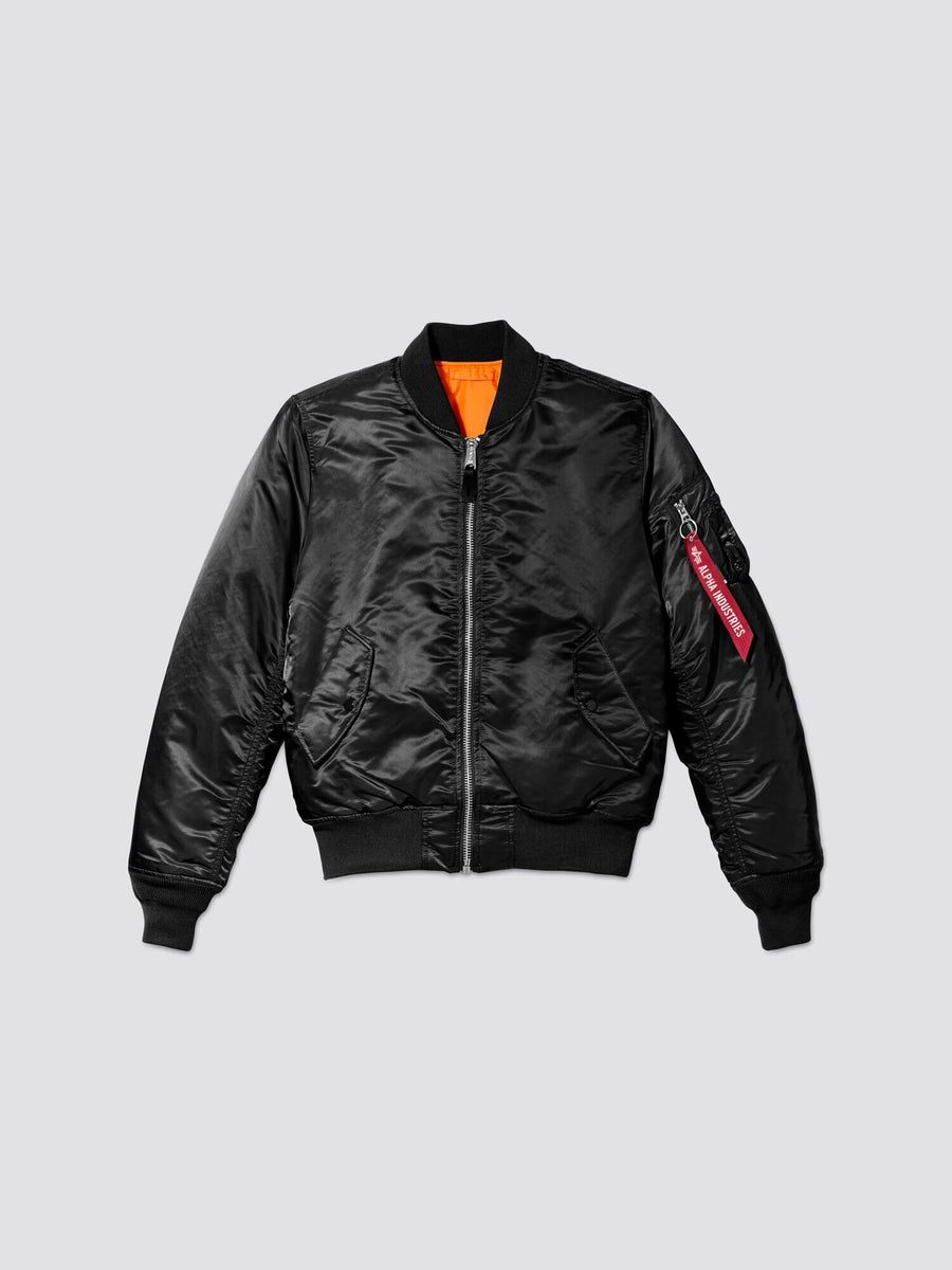 Front flat-lay view of black Alpha Industries MA-1 Bomber Jacket Slim Fit showing orange lining and sleeve pocket with red tag.