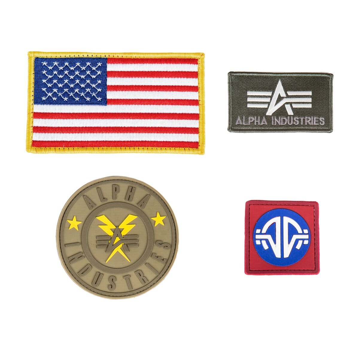 MA-1 Flex Bomber Jacket from Alpha Industries with four embroidered patches: U.S. flag, rectangular logo, round logo, and red square patch with blue and white detailing.