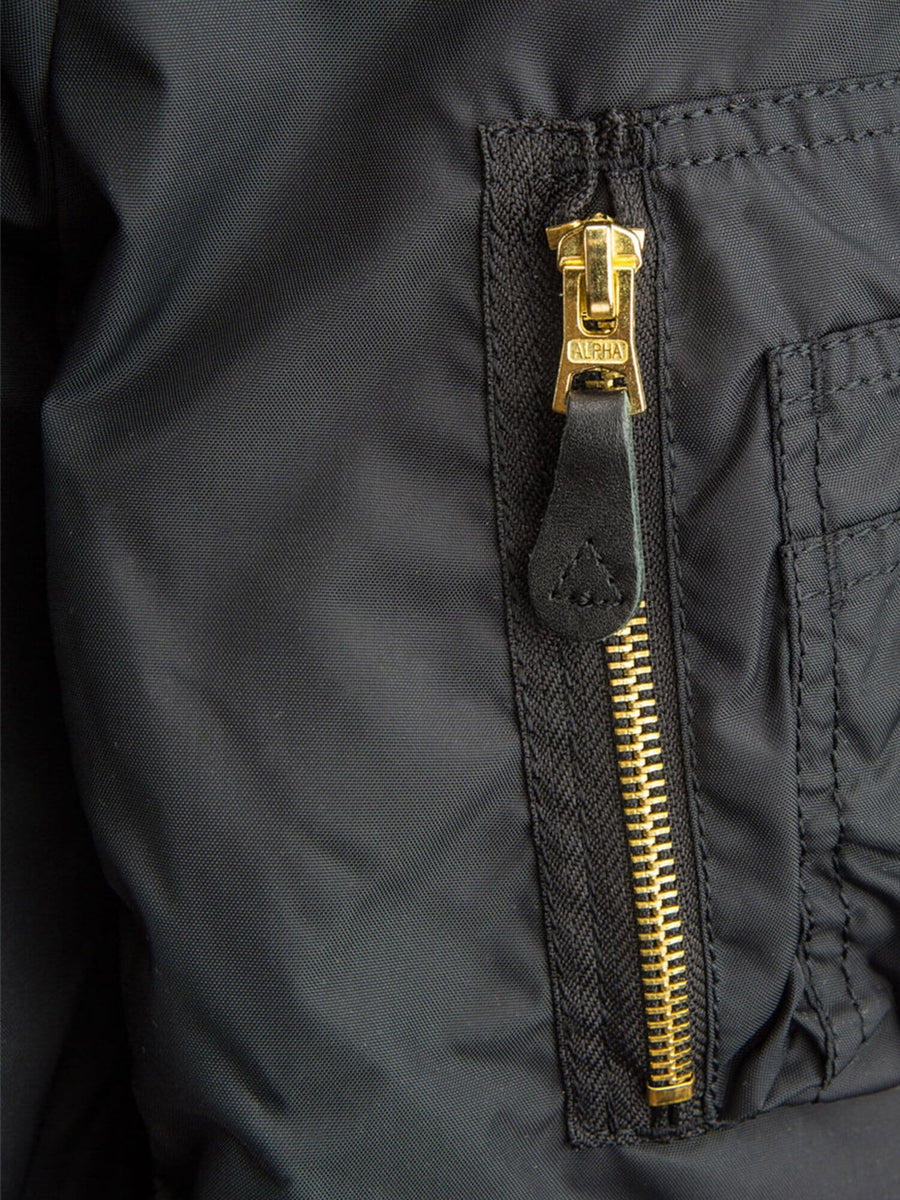 MA-1 Skymaster Bomber Jacket by Alpha Industries, gold zipper with black leather pull tab.