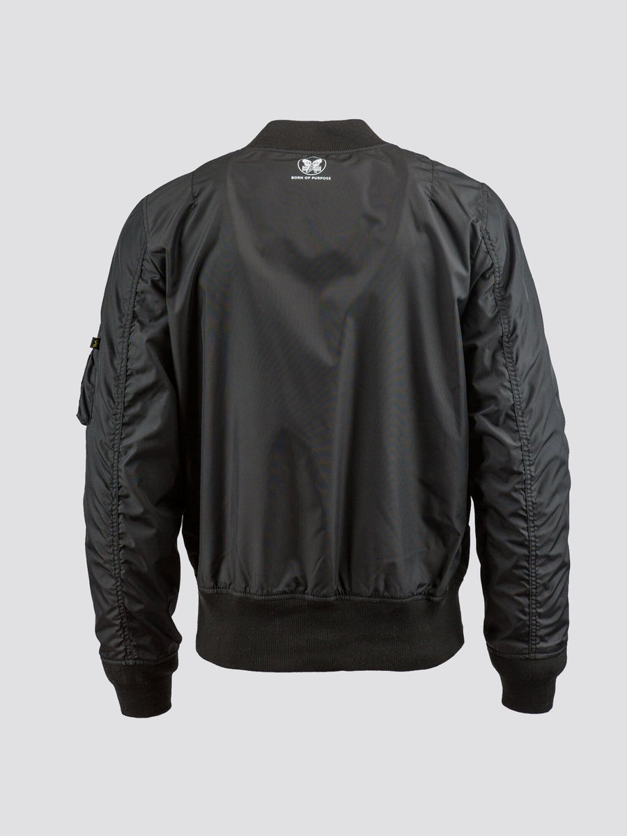 Alpha Industries MA-1 Skymaster Bomber Jacket in black with ribbed cuffs, hem, collar, and small upper back patch.
