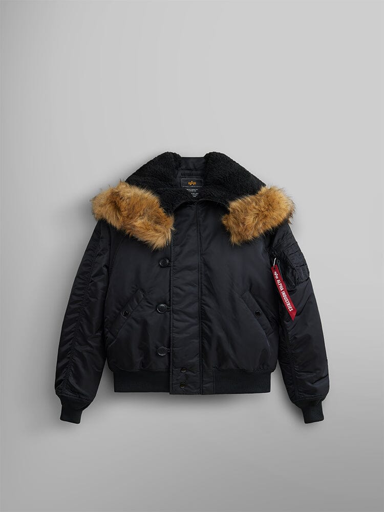 Alpha Industries N-2B Short Waist Parka, black, faux mouton fur-trimmed collar, button and zip closure, ribbed cuffs and hem, red tag on left sleeve pocket.
