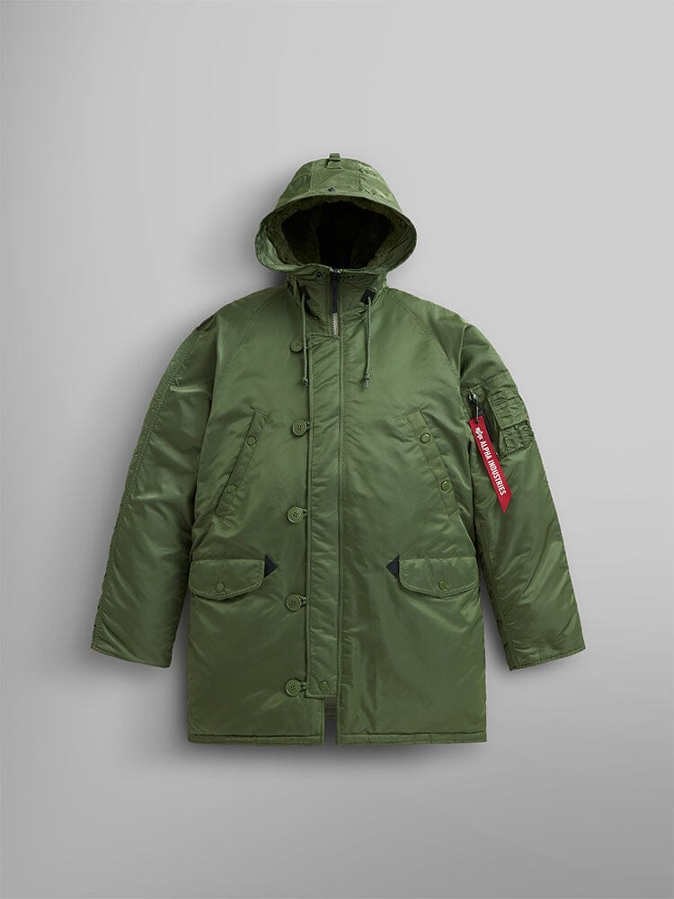 Alpha Industries N-3B Parka, green, water-resistant, front zipper, button closure, flap pockets, snorkel hood, red Remove Before Flight tag on left sleeve.