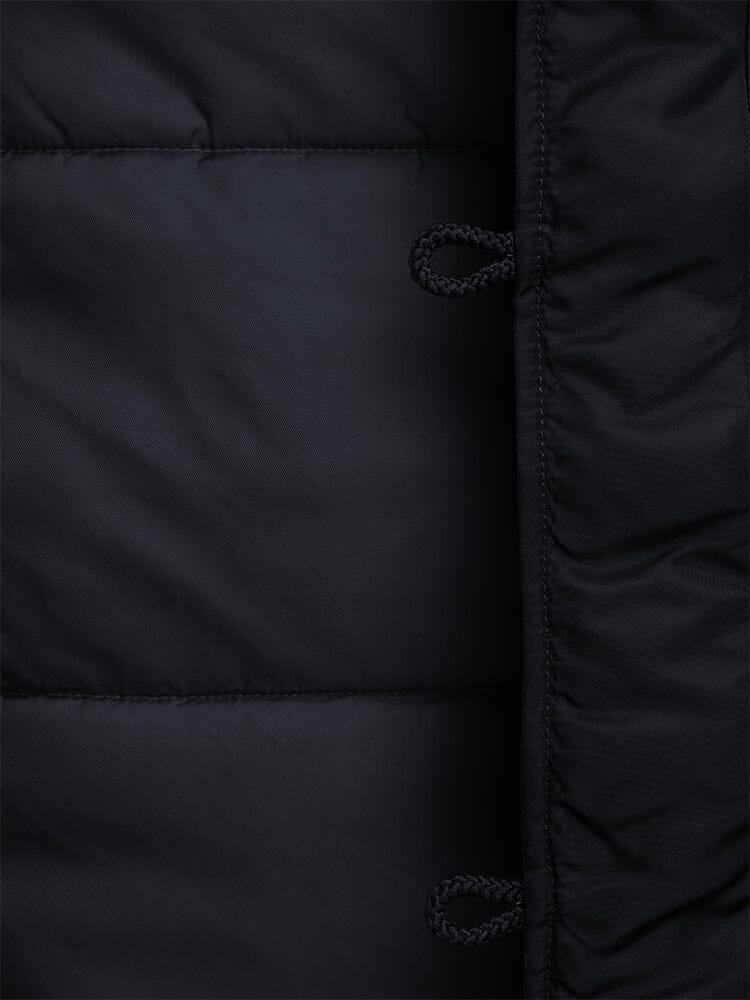 Alpha Industries N-3B Parka: Black padded jacket with horizontal stitching, looped cord detail, water-resistant fabric, MA-1 inspired design.